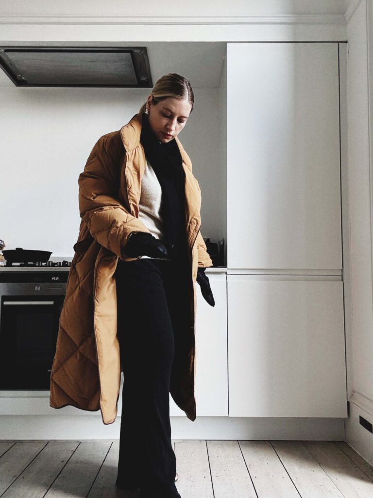 Pointelle trousers in a big coat